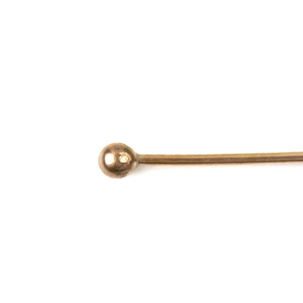 Close-up view of rose gold plated stainless steel ball end on 1 inch 22 gauge headpin, premium quality from Cherry Tree Beads.