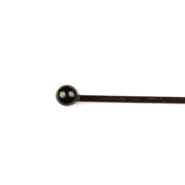Close-up detail of black plated stainless steel 3 inch, 22 gauge ball pin featuring a 2mm ball tip, high-quality jewelry finding by Cherry Tree Beads.