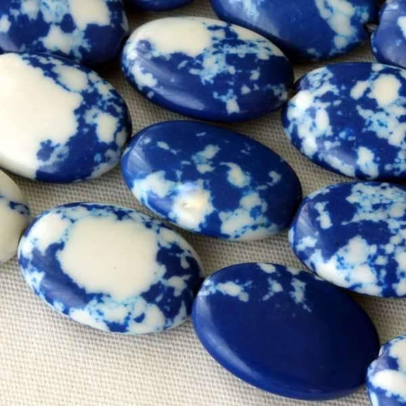 Cherry Tree Beads Synthetic Team Color 10x14mm Blue and White Oval Beads - approx. 8 inch strand 