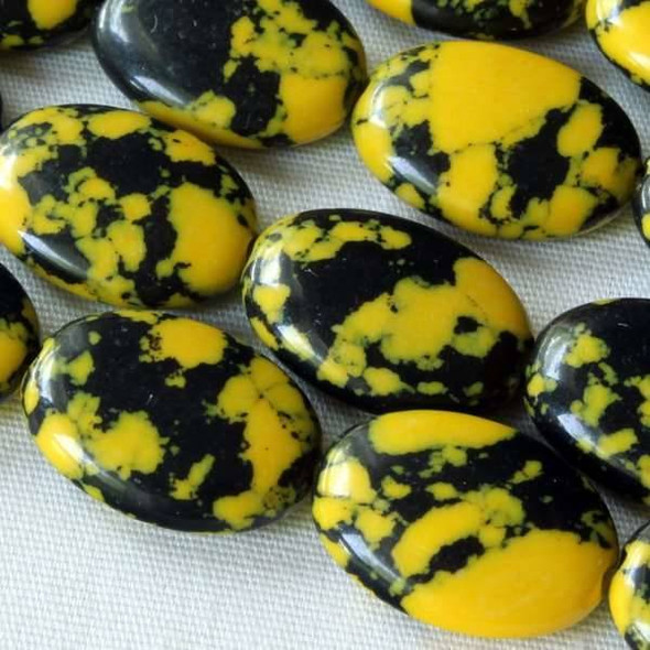 Synthetic Team Color 10x14mm Yellow and Black Oval Beads - approx. 8 inch strand