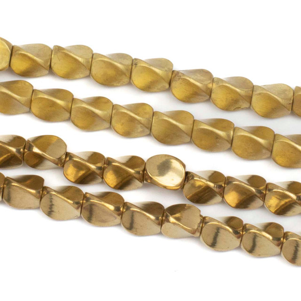Close-up view of twisted 3-sided brass spacer beads in 4.5x5mm size, strung on an 8-inch strand, showing raw and coated brass finish options with 1.5mm holes.