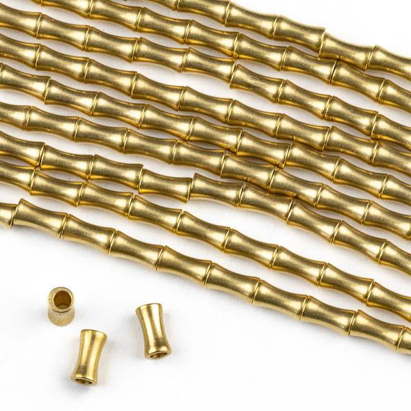 Raw Brass 3x5mm Dog Bone Spacer Beads with approximately 1.3mm Hole - approx. 8 inch strand