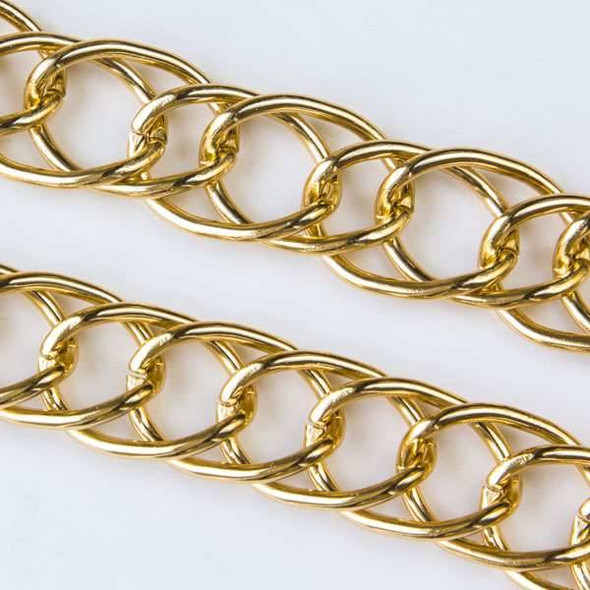 Gold Aluminum Chain with 15x22mm Open Twisted Double Oval Links - chainK14610g - 1 foot