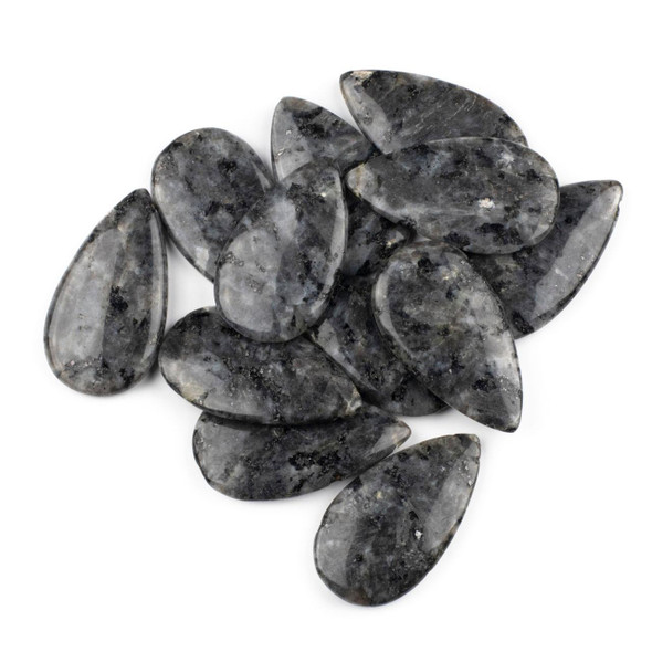 A collection of Black Labradorite/Larvikite 24x44mm Top Side Drilled Teardrop Pendants, showcasing the natural gemstone's grey and black marbled patterns, polished to a smooth finish.