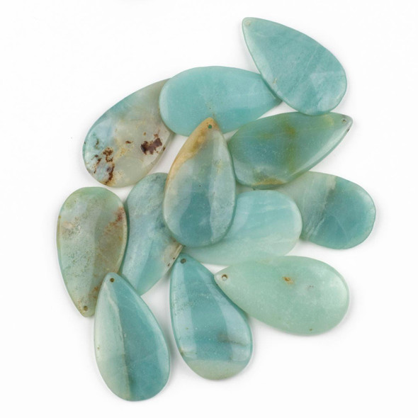 Group of 24x44mm Amazonite teardrop pendants, top front drilled and made from natural gemstone, offered by Cherry Tree Beads. Group of 24x44mm Amazonite teardrop pendants, top front drilled and made from natural gemstone, offered by Cherry Tree Beads.