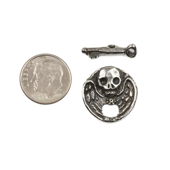 Green Girl Studios pewter 19mm skeleton key toggle with a 6x19mm bar, displayed next to a dime for size reference, crafted from pewter for jewelry making and detailed closures.