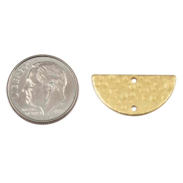 Textured half moon link component in brass, with two holes, available in raw or coated finishes, displayed next to a coin