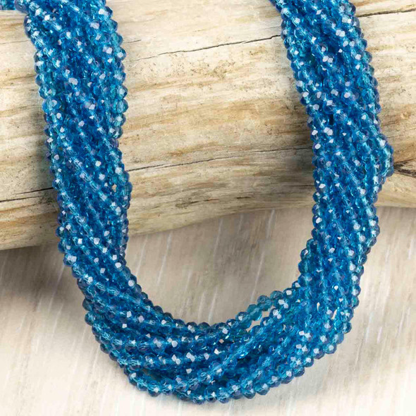 Crystal Beads - 2.5x3mm Faceted Rondelles, Peacock Blue, 15 inch strand