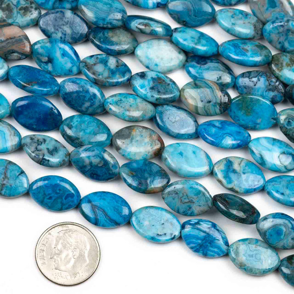 Special Gems dyed blue crazy lace agate 10x15mm marquise beads crafted from gemstones, strung on a 16 inch strand and shown beside a US dime for size comparison.