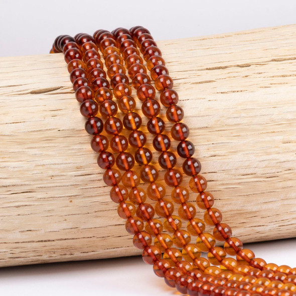 Cherry Tree Beads Amber 4mm Round Beads - 15 inch strand 