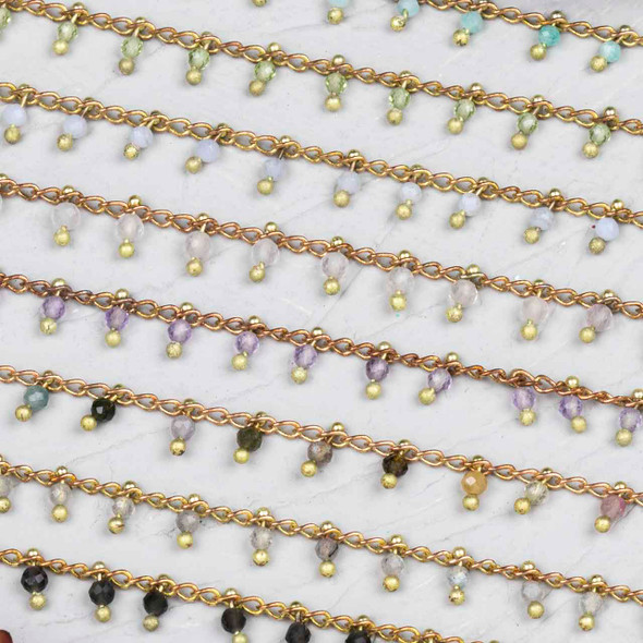 Close-up of raw brass dangle chain with 2mm faceted gemstone beads in multiple stone options including amethyst, labradorite, and rose quartz, ideal for custom jewelry making.