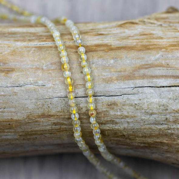 Cherry Tree Beads BOGO Rutilated Quartz 2mm Round Beads - 15 inch strand 