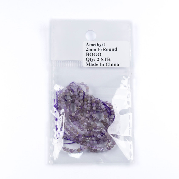 Close-up of Cherry Tree Beads BOGO Amethyst 2mm Faceted Round Beads showing the natural purple color, sparkling faceted surface, and small round bead shape.