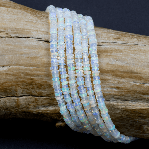 Cherry Tree Beads White Opal Graduated approx. 2x4mm Irregular Rondelle Beads - 15.5 inch strand
