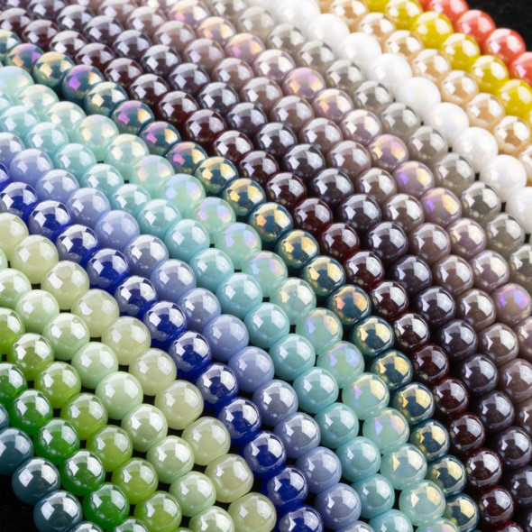 classic round shape with a smooth, polished surface that brings vibrant color and timeless style to jewelry designs