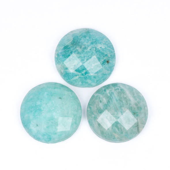 Faceted amazonite cabochon for DIY jewelry projects.