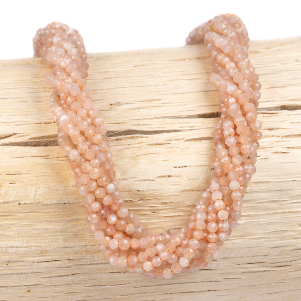 Tiny peach moonstone beads for craft night.