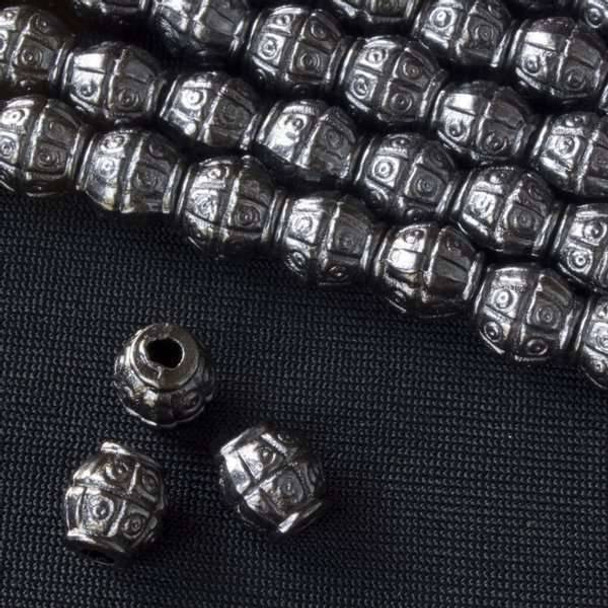 Gun Metal Colored Pewter 7mm Tapered Barrel Beads with Grid & Circle Pattern - approx. 8 inch strand - basea0285gm
