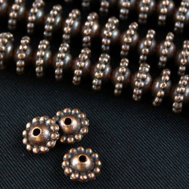 Vintage Copper Colored Pewter 5x9mm Smooth Round Beads with Dots Around Center - approx. 8 inch strand - basea0736vc