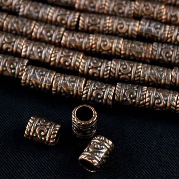 Cherry Tree Beads Vintage Copper Colored "Pewter" (zinc-based alloy) 7x9mm Tube Beads with Center Scrolls and a 4mm Large Hole - approx. 8 inch strand - basea0834vc 