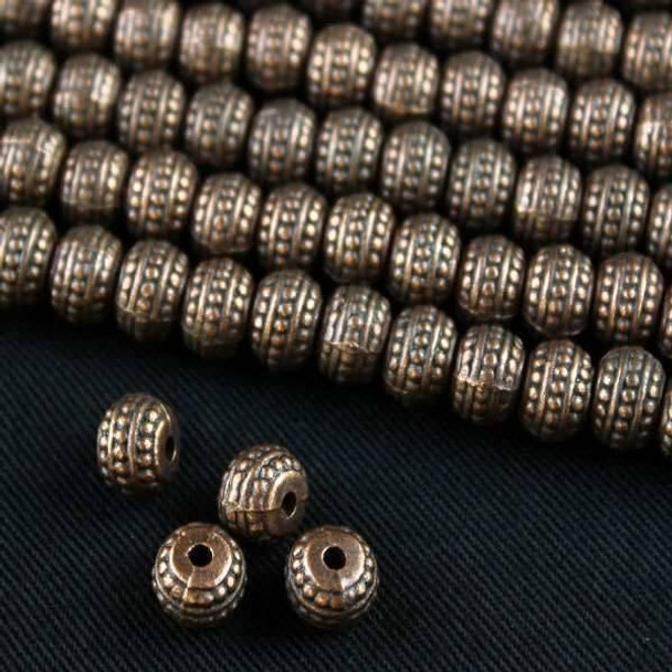 Cherry Tree Beads Vintage Copper Colored "Pewter" (zinc-based alloy) 5x7mm Tire Rondelle Beads with 3 Dotted Rows - approx. 8 inch strand - basea0883vc 