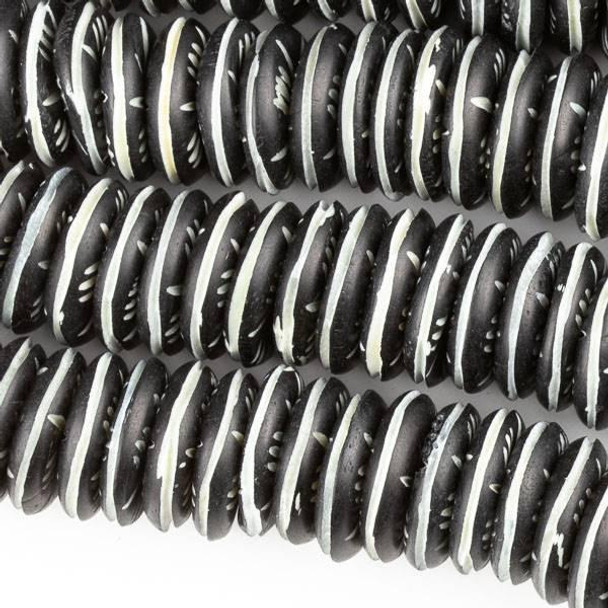 Cherry Tree Beads 4x19mm black bone saucer beads with carved white line details and 2.5mm large holes, 8-inch strand.