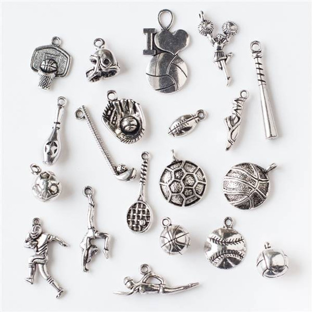 An Assorted Mix of 25 Silver Sports Charms