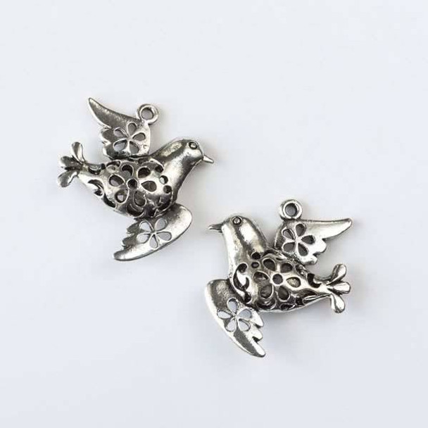 Silver Pewter 32x35mm Flying Bird Charm with Cut Out Flowers - 2 per bag