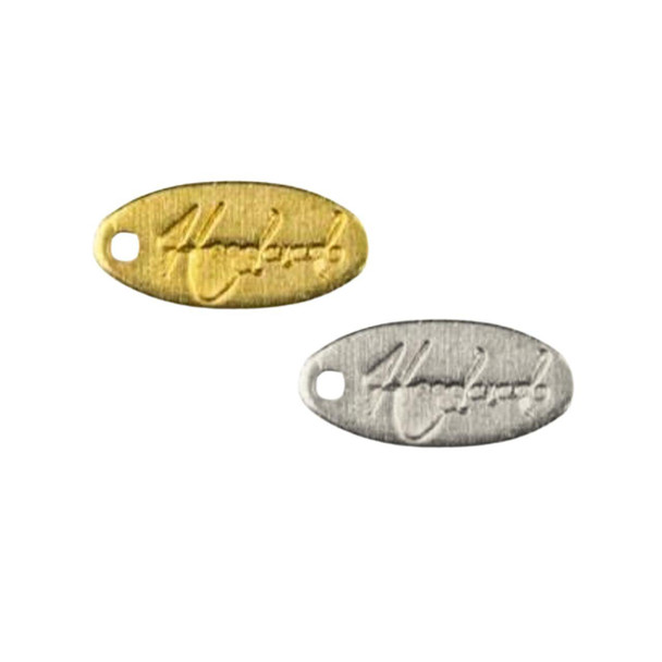 Cherry Tree Beads Brass 5x11mm "Handmade" Oval Tag Charm - 6 per bag  Cherry Tree Beads Brass 5x11mm "Handmade" Oval Tag Charm - 6 per bag