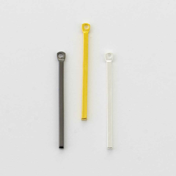 Create jewelry with clean lines and modern style using our Plated Brass 2x30mm Rectangle Drop. The long, narrow shape offers a graceful look that works beautifully as a focal accent or connector. Made from plated brass, these rectangular drops pair easily with gemstones, crystals, pearls, and charms, making them a versatile addition to many jewelry designs.