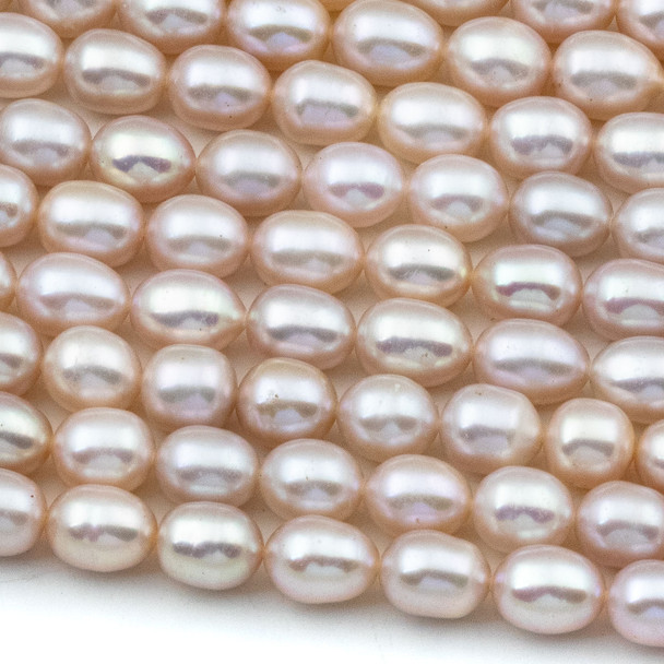 Fresh Water Pearl 7x9mm Pink Rice Beads - 15.5 inch strand