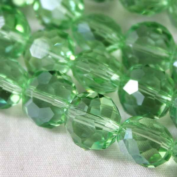 Glass Crystal Faceted 10mm Chrysolite Coin - approx. 8 inch strand
