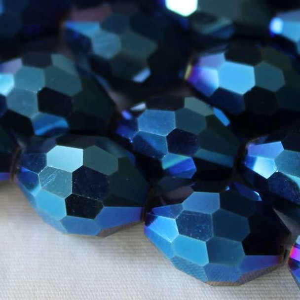 Glass Crystal Faceted 10x13mm Opaque Blue Rainbow Rice - approx. 8 inch strand