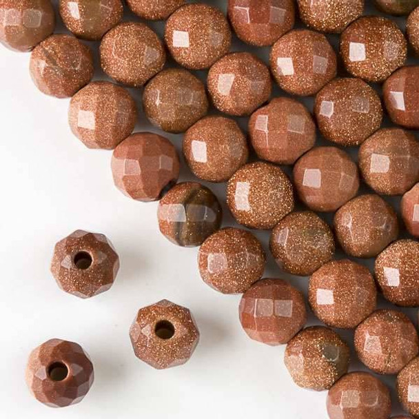 Faceted Large Hole Goldstone 10mm Round with a 2.5mm Drilled Hole - approx. 8 inch strand