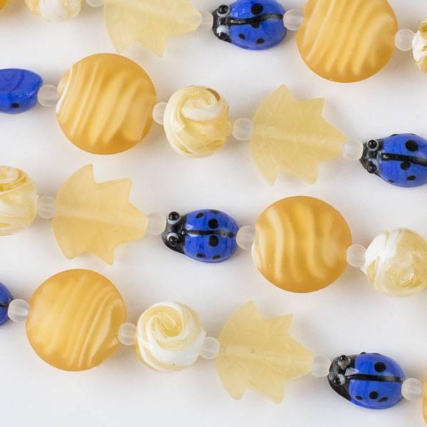 Cherry Tree Beads Handmade Lampwork Glass Nature Collection - Blue Ladybug and Matte Honey Yellow Mix with Leaf, Coin, and Round 