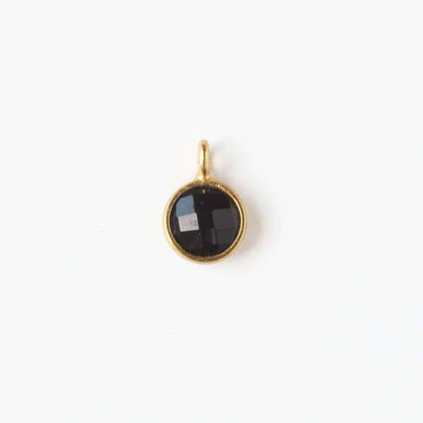 Onyx 7x10mm Coin Drop with a Gold Plated Brass Bezel