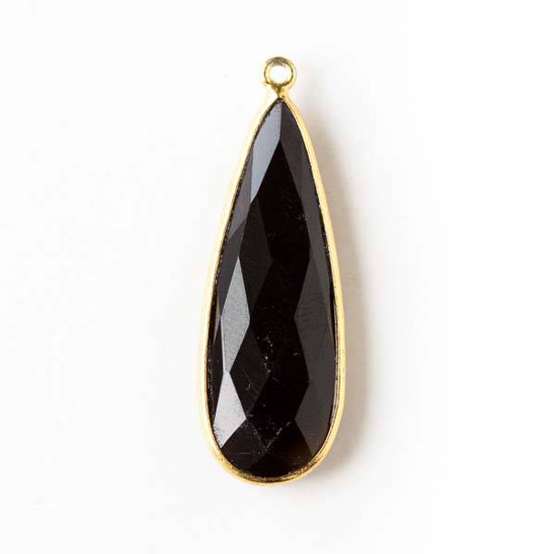 Onyx approximately 11x35mm Long Teardrop Drop with a Gold Plated Brass Bezel