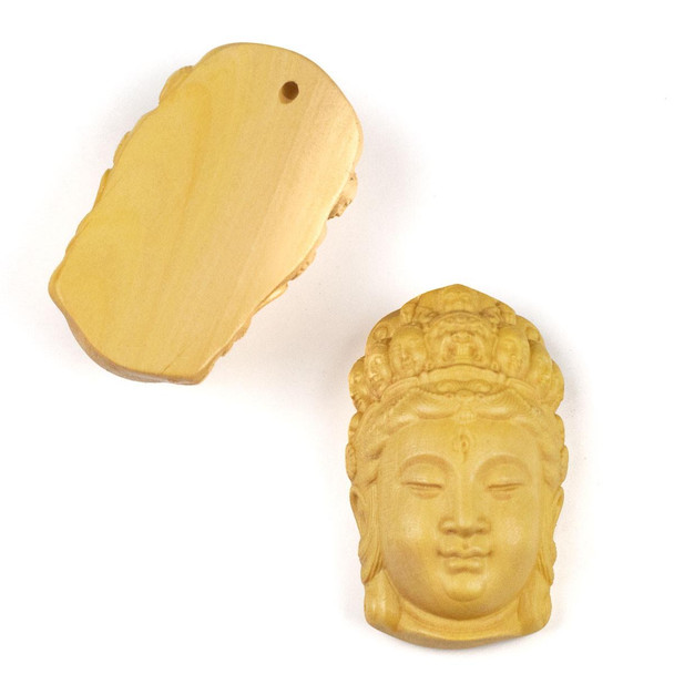 22x38mm carved wood focal bead hand-carved from boxwood, showcasing Kuan Yin with a crown of faces, available from Cherry Tree Beads.