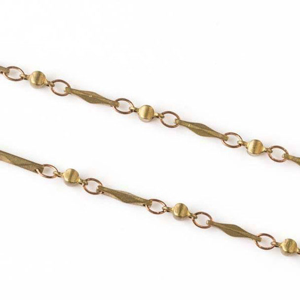Cherry Tree Beads Raw Brass Chain with 2.5x3.5mm Small Oval Links alternating with 2.5x5.5mm Cushion Links and 1.5x9mm Faceted Bar Links - chain2583vb-sp - 10 meter spool 