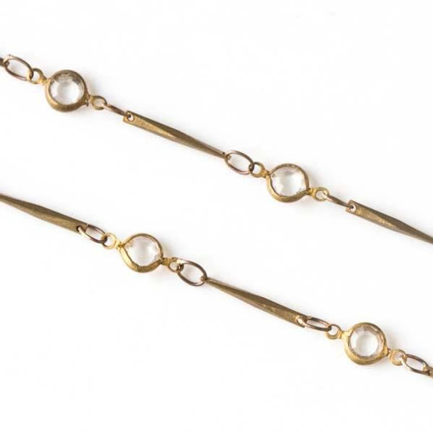 Cherry Tree Beads Raw Brass Chain with 2.5x3.5mm Small Oval Links alternating with 4.5x9mm Clear Crystal Coin Links and 1x12mm Twisted Bar Links - chain2522vb-sp - 10 meter spool 