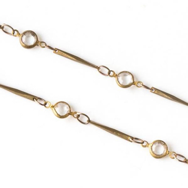 Cherry Tree Beads Raw Brass Chain with 2.5x3.5mm Small Oval Links alternating with 4.5x9mm Clear Crystal Coin Links and 1x12mm Twisted Bar Links - chain2522vb-2m - 2 meters 
