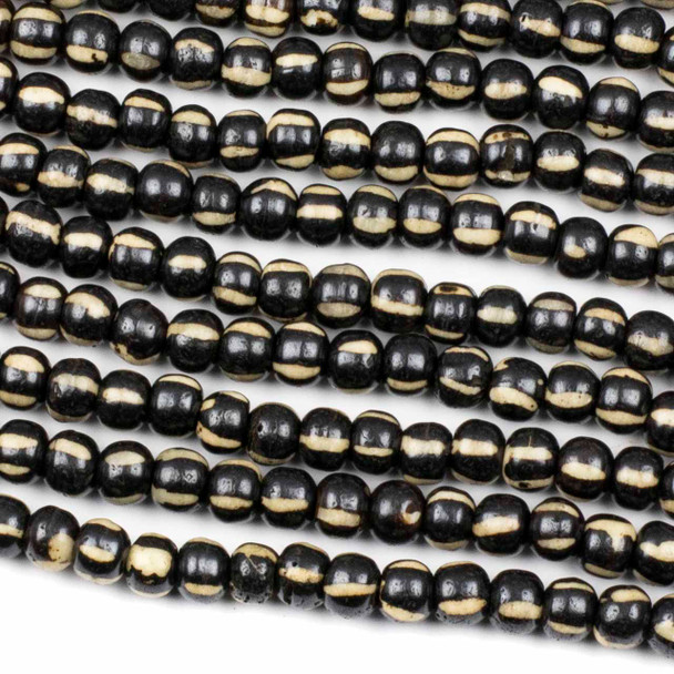 Bone 5x7mm Black Rondelle Beads with Carved White Vertical Lines - 8 inch strand