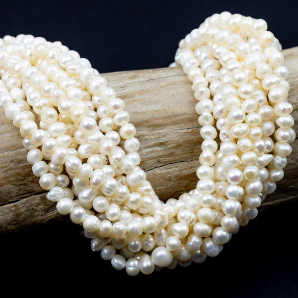 Cherry Tree Beads Freshwater Pearl 4-5mm White Potato Beads - 14 inch strand 