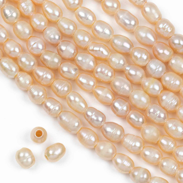 Large Hole Fresh Water Pearl 6-8x7-9mm Peach Rice Beads with a 2mm Large Hole - approx. 8 inch strand