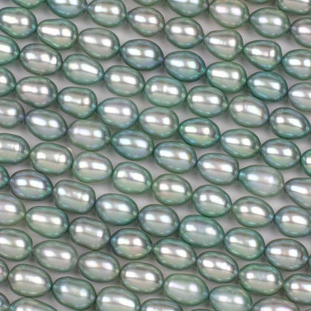 Fresh Water Pearl 7x9mm Green Rice Beads - 16 inch strand