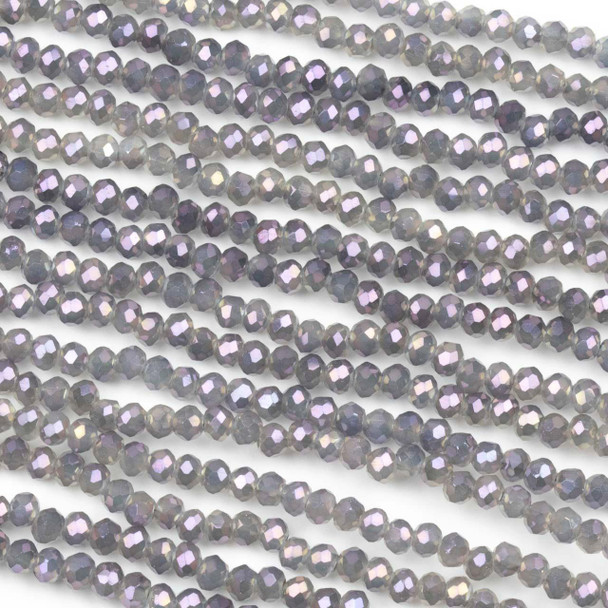 Crystal approximately 2x2mm opaque ash gray faceted rondelle beads with an AB finish on a 15-inch circular strand, featuring shimmering crystal beads perfect for sophisticated jewelry designs.