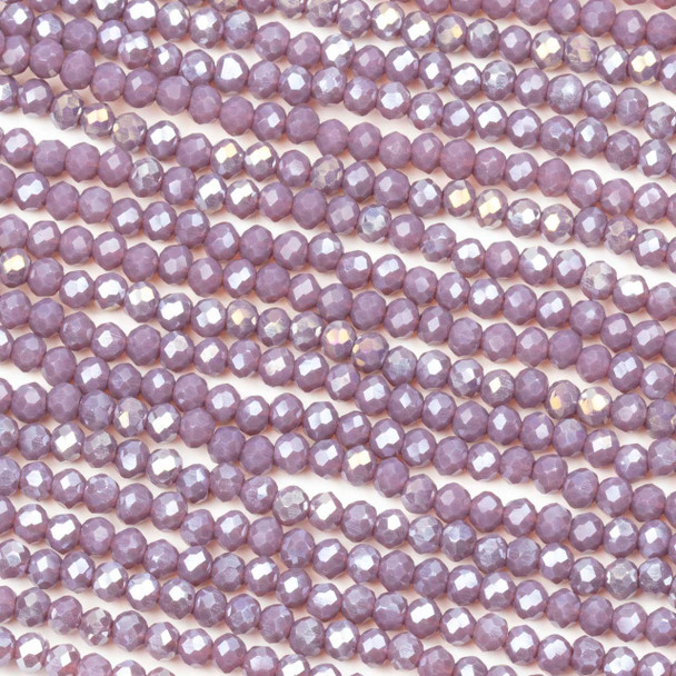 Crystal approximately 2x2mm opaque faded purple faceted rondelle beads with an AB finish on a 16-inch strand, featuring shimmering crystal beads ideal for unique jewelry designs.