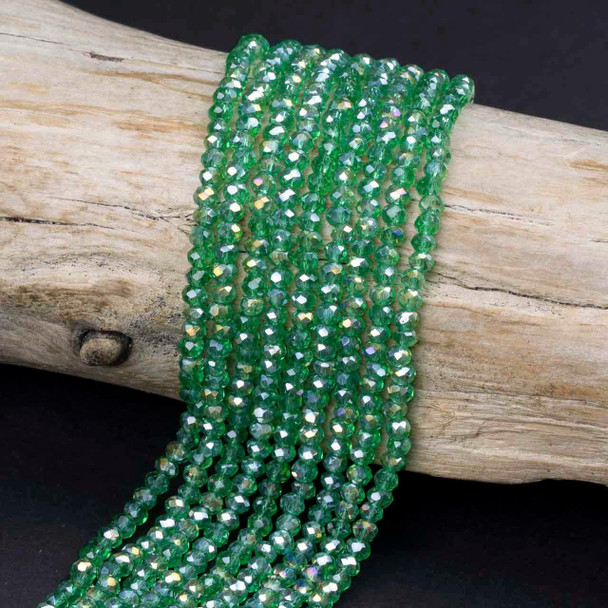 Cherry Tree Beads Crystal Beads - 2x3mm Faceted Rondelles, Emerald Green with an AB finish, 14 inch strand 