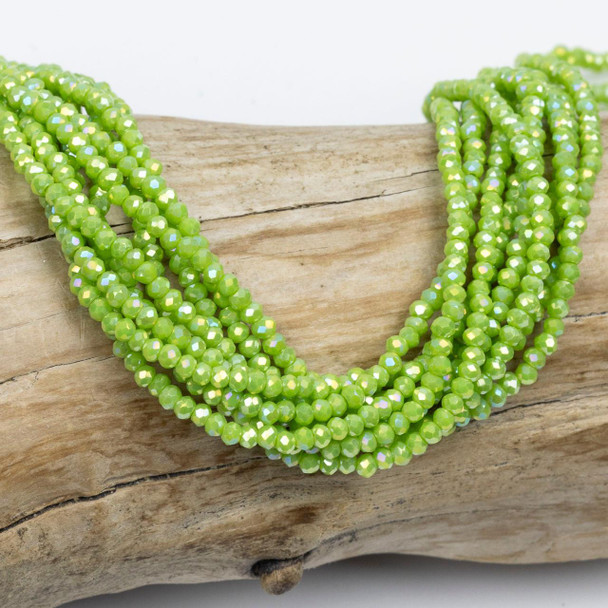 Cherry Tree Beads Crystal Beads - approx. 2x2.5mm Opaque Pear Green Faceted Rondelles with AB finish, 15 inch strand  Cherry Tree Beads Crystal Beads - approx. 2x2.5mm Opaque Pear Green Faceted Rondelles with AB finish, 15 inch strand