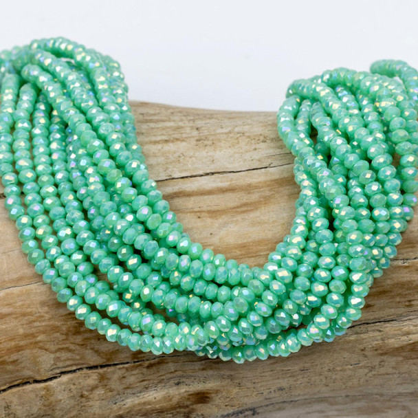 Cherry Tree Beads Crystal Beads - approx. 2x2.5mm Opaque Seafoam Green Faceted Rondelles with AB finish, 15 inch strand  Cherry Tree Beads Crystal Beads - approx. 2x2.5mm Opaque Seafoam Green Faceted Rondelles with AB finish, 15 inch strand